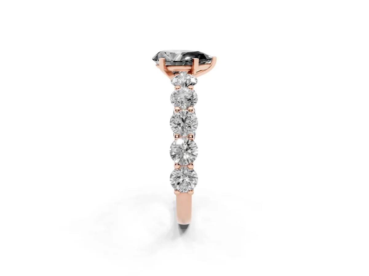 Fancy Black Pear Cut Diamond Prong Setting with Side Stones on a Pave Band Rose gold