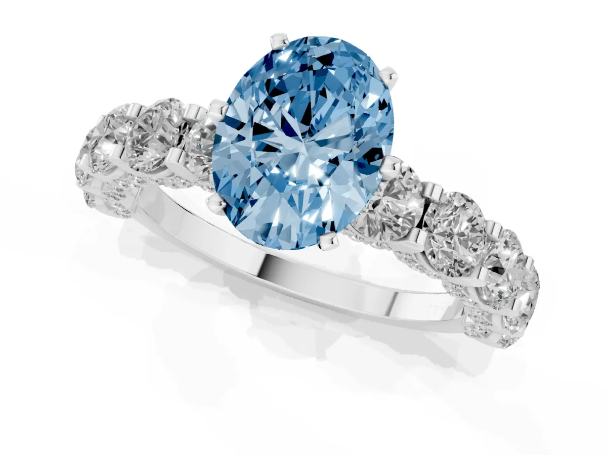 Fancy Blue Oval Cut Diamond Side Stone Engagement Ring with Four-Prong Setting Platinum