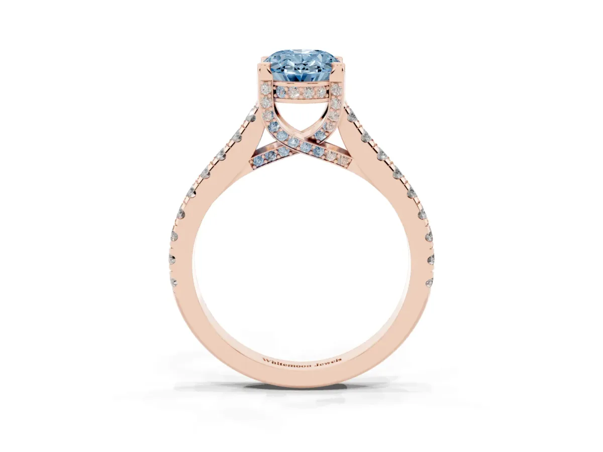 Fancy Blue Oval Cut Brilliant Diamond Solitaire with Pavé Band and Four-Prong Setting Rose gold