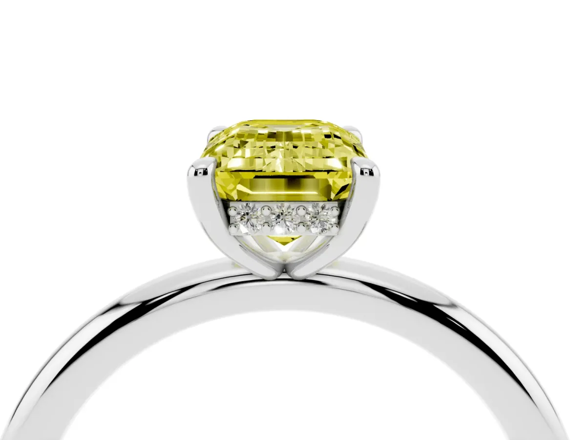 Fancy Yellow Emerald Cut Diamond Solitaire Ring with Thin Band and Four-Prong Setting Silver