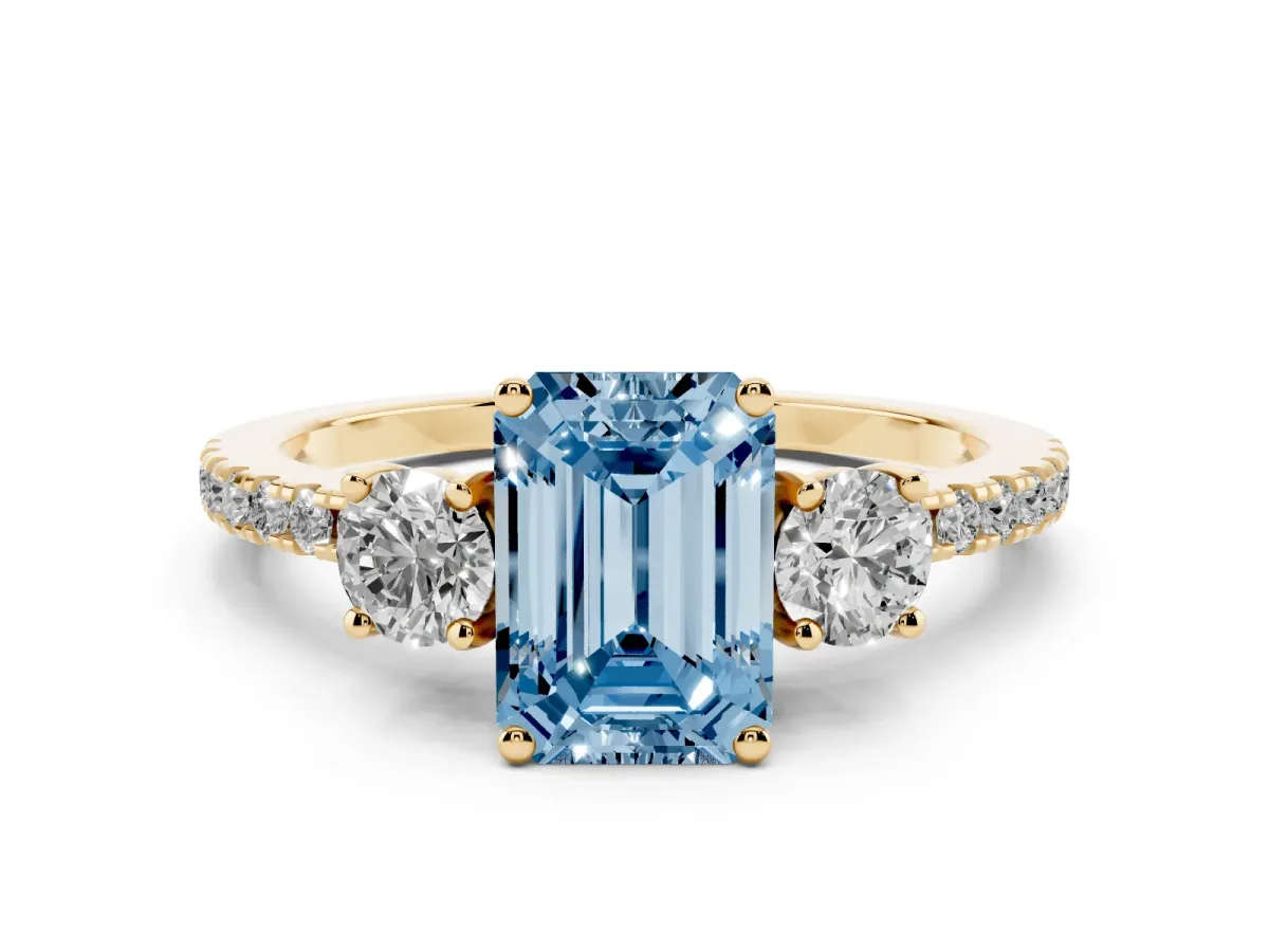 Fancy Blue Three-Stone Emerald Cut Cut Diamond Pavé Band with Prong Setting Yellow gold