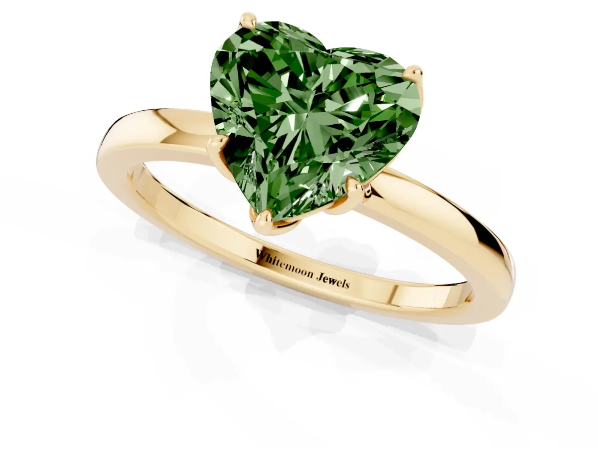 Fancy Green Heart Cut Diamond Solitaire Ring with Thin Band and Prong Setting Yellow gold