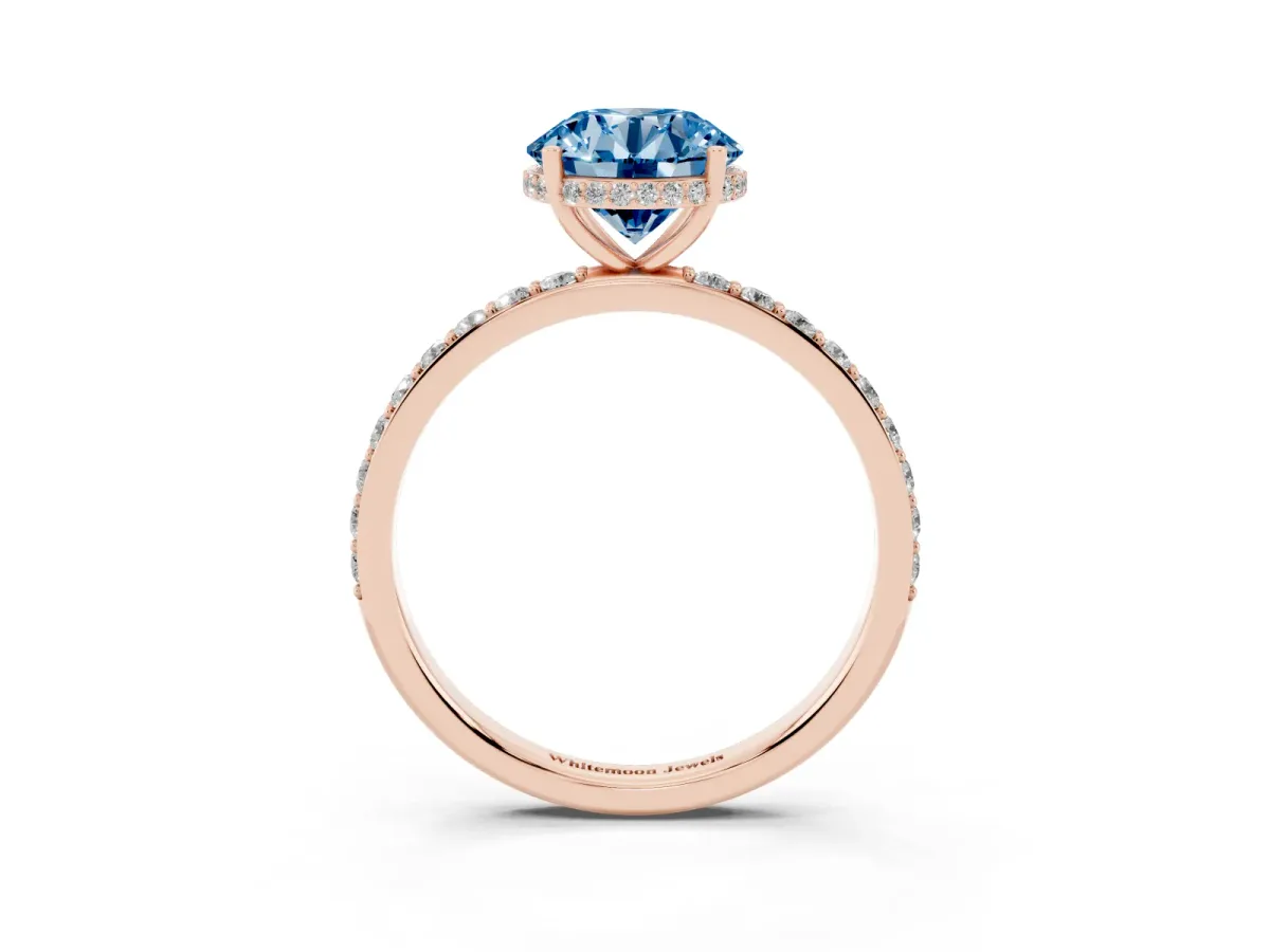 Fancy Blue Round Cut Diamond Solitaire Ring with Pavé Band and Hidden Halo Rose gold