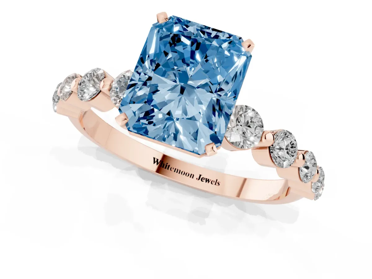 Fancy Blue Radiant Cut Solitaire Diamond Ring with Pave Band and Four-Prong Setting Rose gold