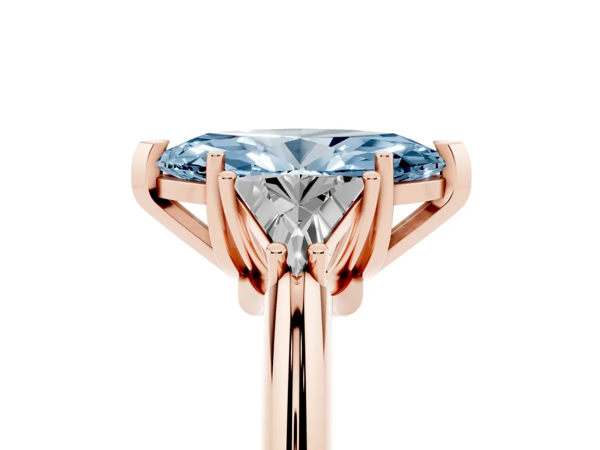 Fancy Blue Three-Stone Marquise Cut Diamond Engagement Ring with Trillion Side Stones and Prong Setting Rose gold