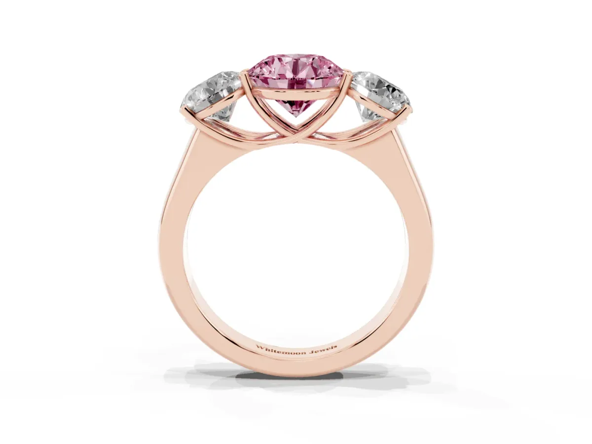 Fancy Pink Round Cut Three-Stone Diamond Ring with Prong Setting on a Classic Band Rose gold