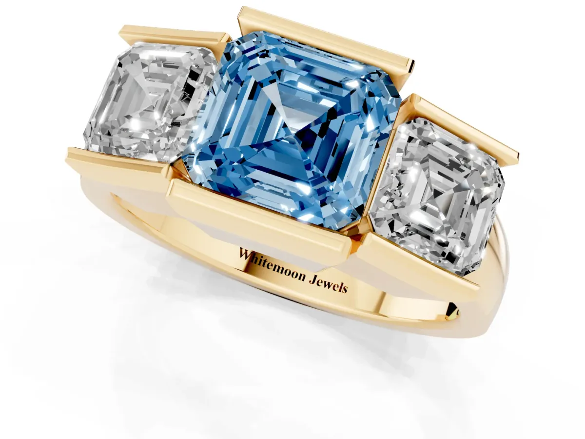 Fancy Blue Three Stone Asscher Cut Cut Channel Set Diamond Ring Yellow gold