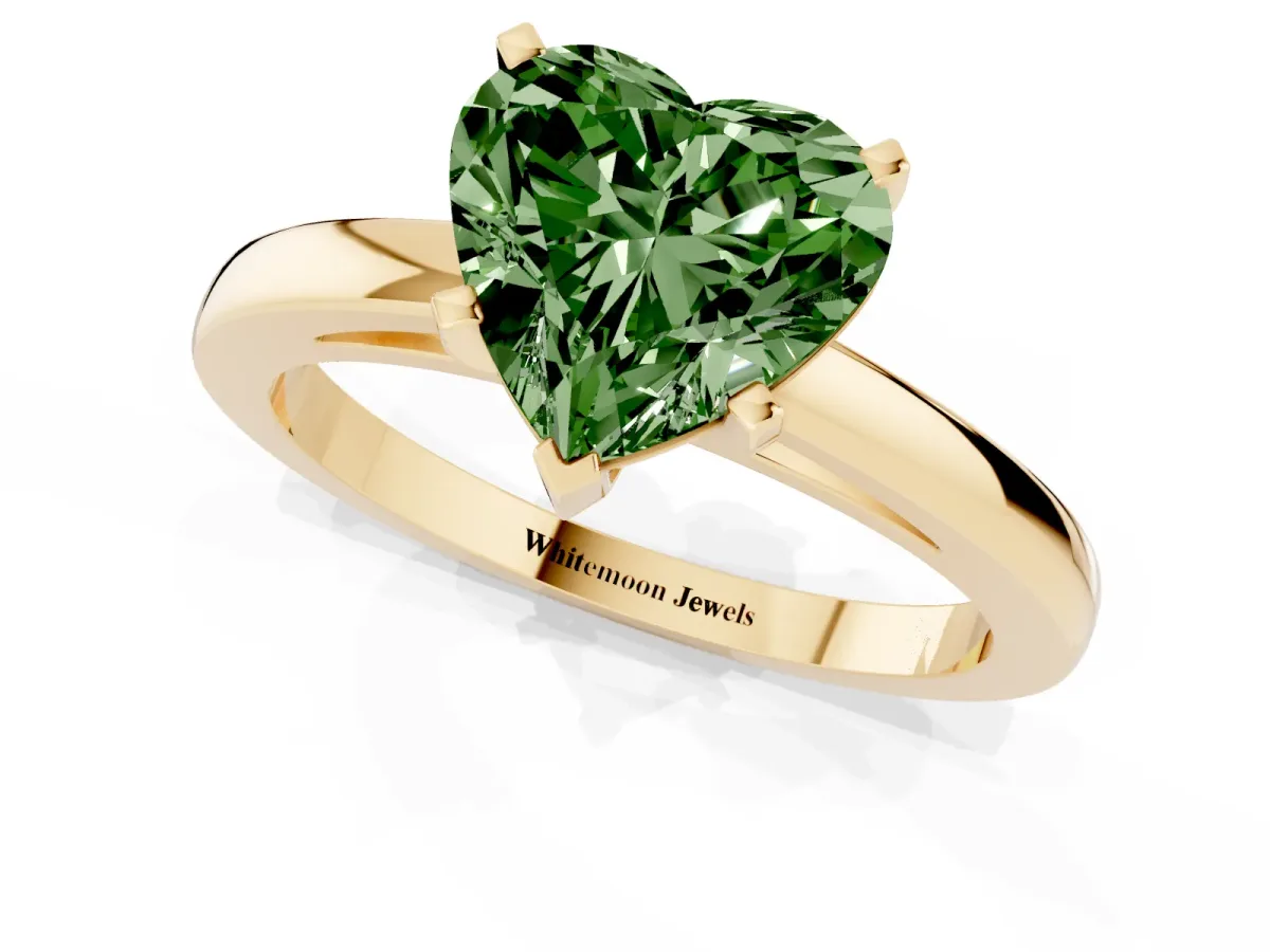 Fancy Green Heart Cut Solitaire Diamond Engagement Ring with Four-Prong Setting on a Classic Band Yellow gold