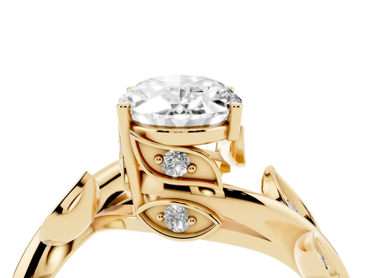 Oval Cut Solitaire Twist Engagement Ring with Leaf Accents and Prong Setting Yellow gold