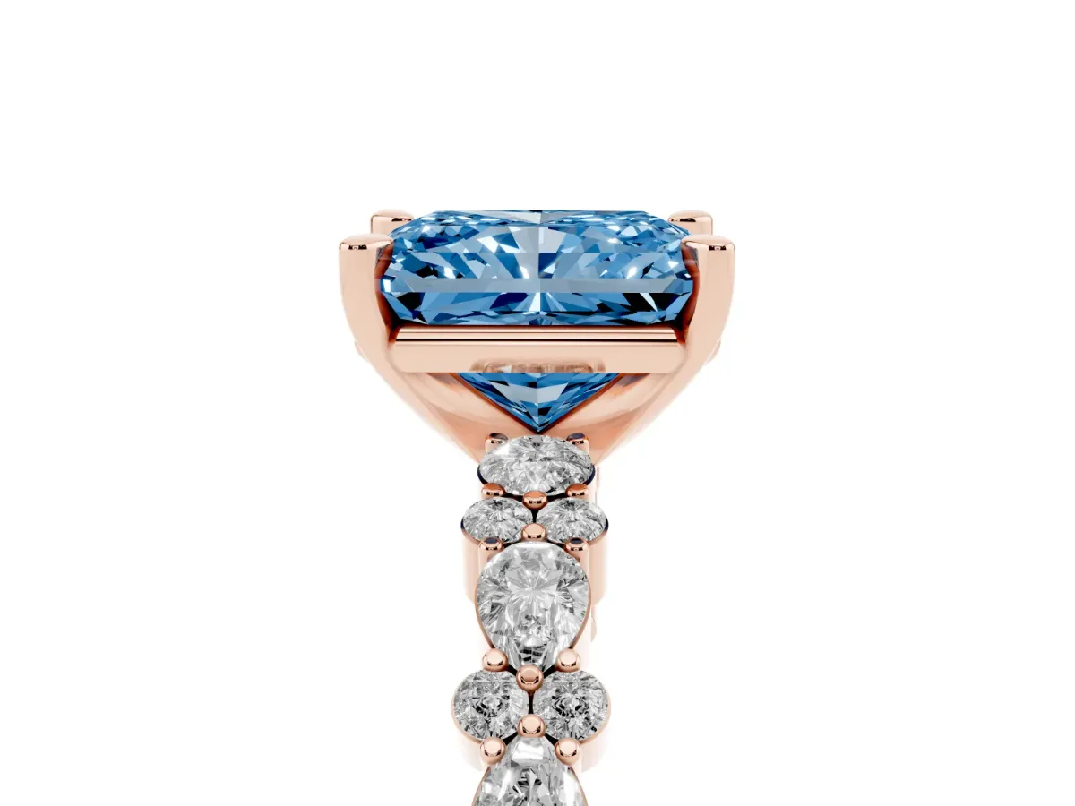 Fancy Blue Radiant Cut Diamond Side Stone Solitaire Ring with Round and Four-Prong Setting Rose gold
