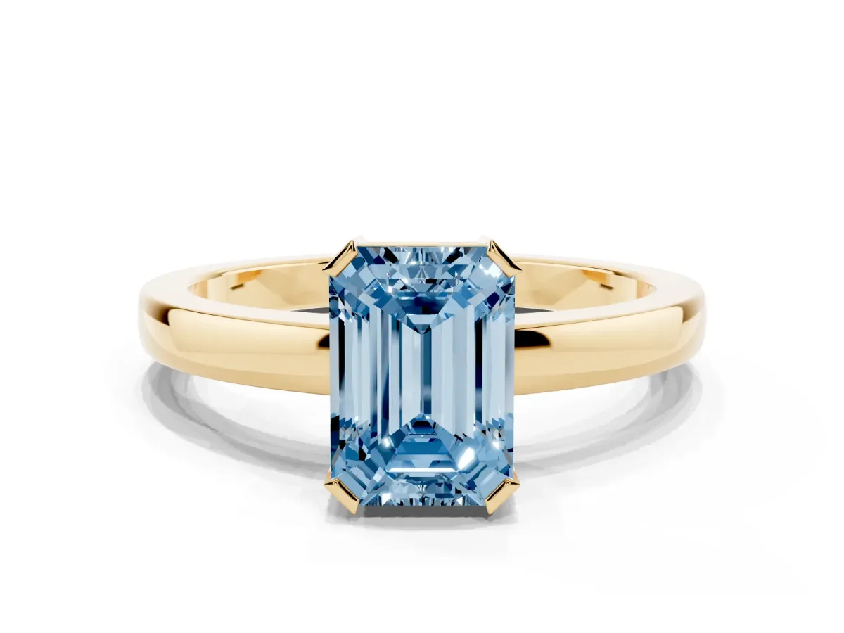 Fancy Blue Emerald Cut Cut Solitaire Ring with Four-Prong Setting and Classic Band Yellow gold