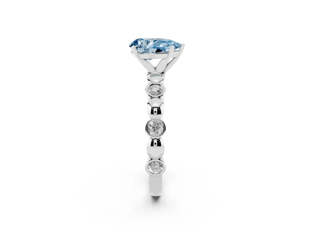 Fancy Blue Pear Cut Solitaire Bezel-Set Diamond Ring with Beaded Band and Four-Prong Setting Silver
