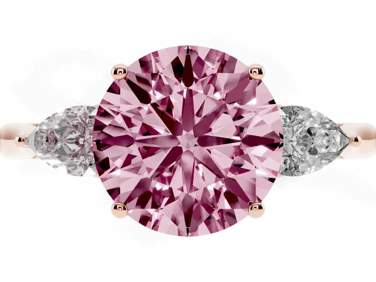 Fancy Pink Three-Stone Round Cut Diamond Ring with Pear Side Stones in Four-Prong Setting Rose gold