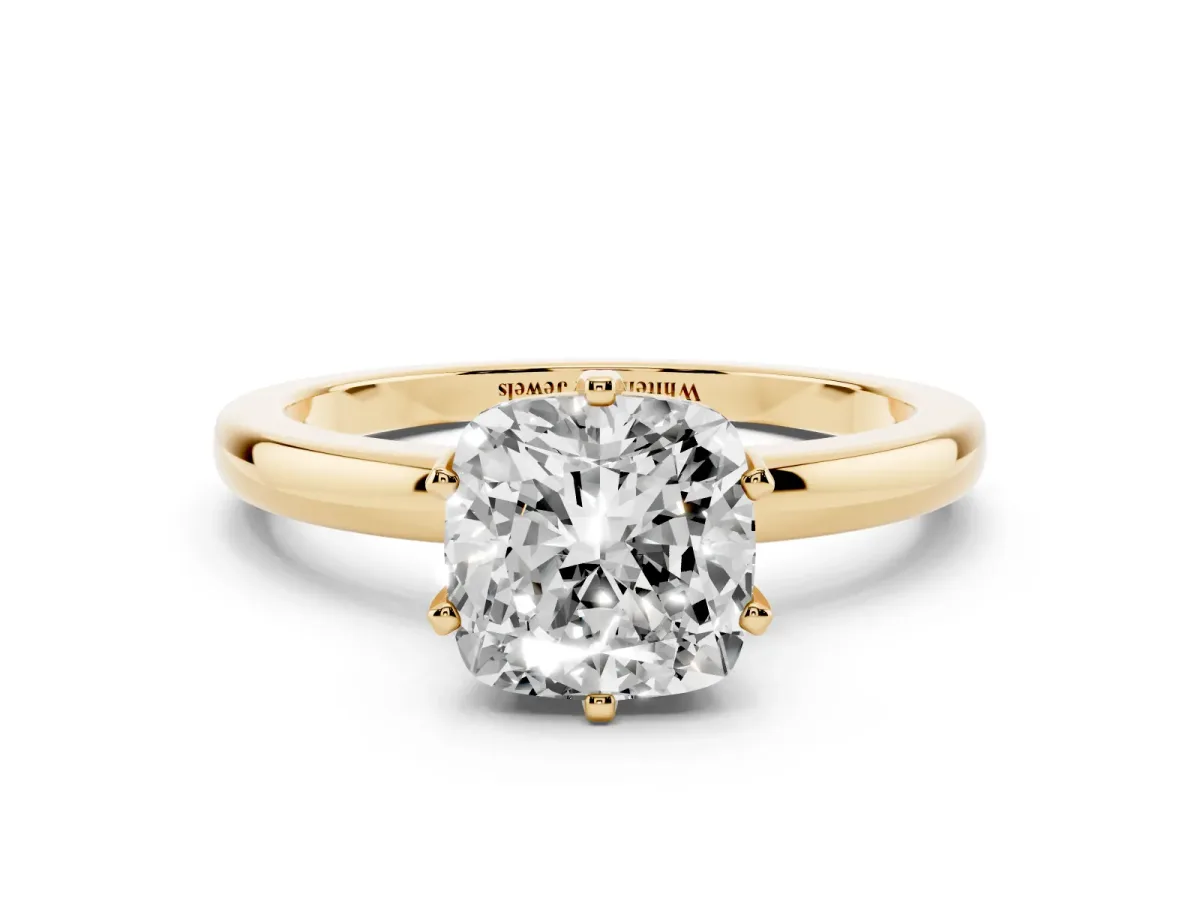 Cushion Cut Solitaire Diamond Ring with Six-Prong Setting on a Classic Band Yellow gold