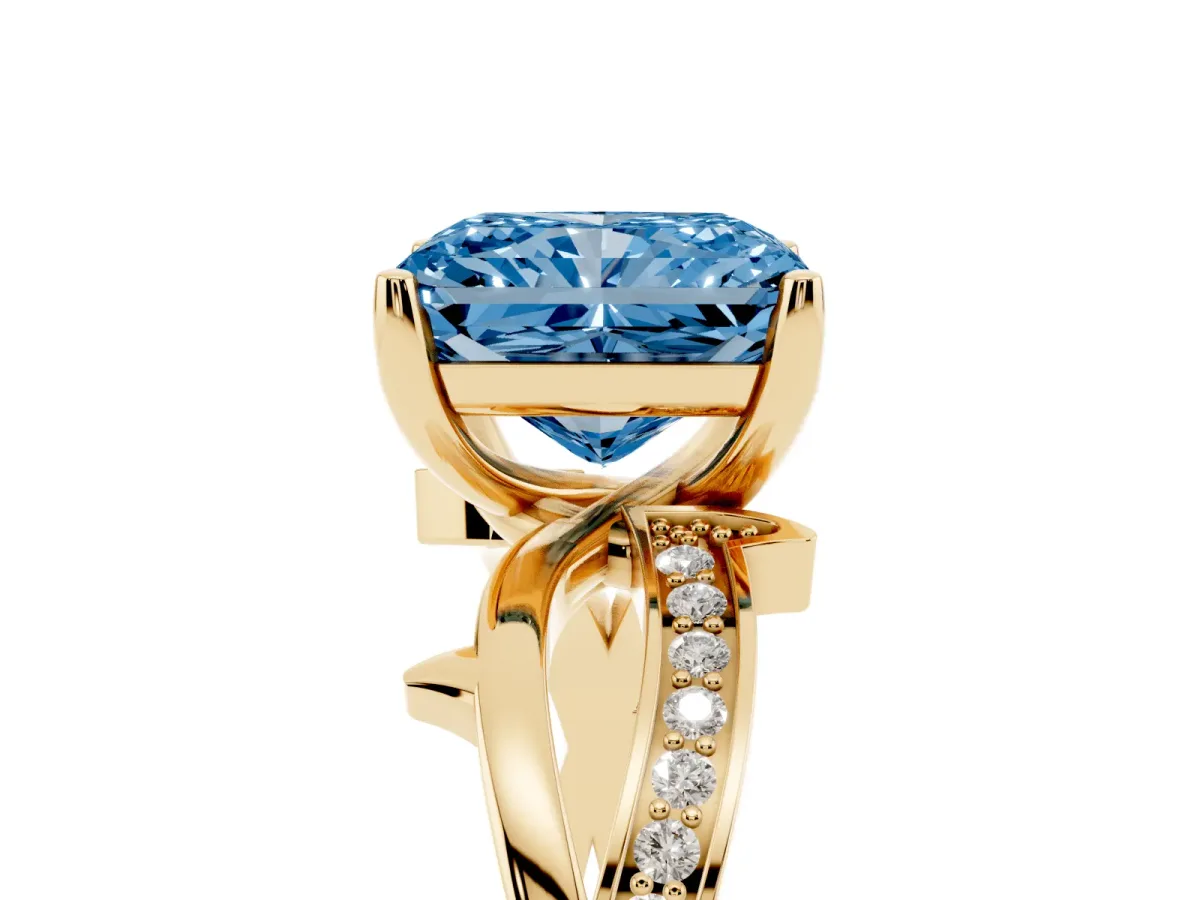 Fancy Blue Radiant Cut Solitaire Twist Band with Pavé Accents and Four-Prong Setting Yellow gold
