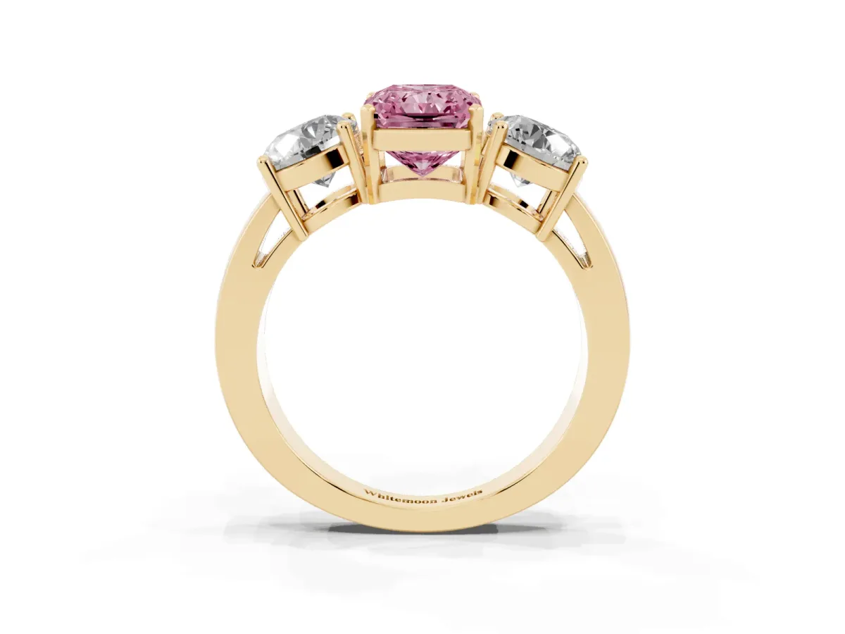Fancy Pink Three-Stone Radiant Cut Diamond Ring with Round Side Stones, Classic Band, and Four-Prong Setting Yellow gold