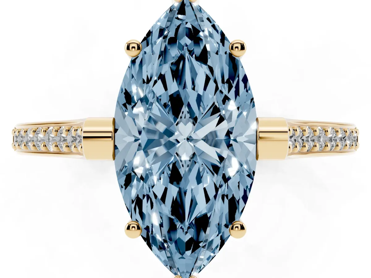 Fancy Blue Marquise Cut Solitaire Diamond Ring with Channel Set Band and Bezel Prong Setting Yellow gold