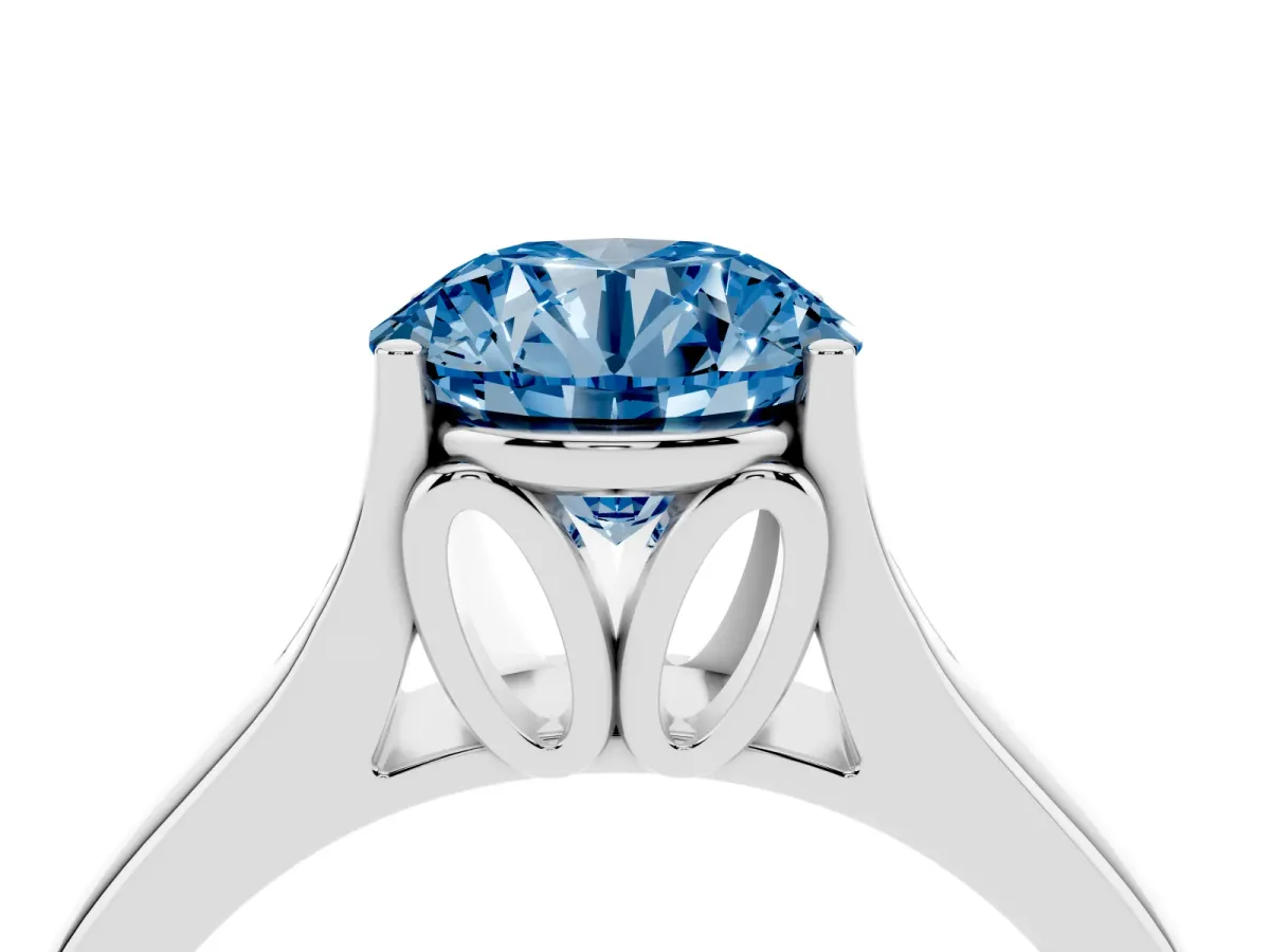 Fancy Blue Round Cut Solitaire Diamond Ring with Cathedral Band and Four-Prong Setting Silver