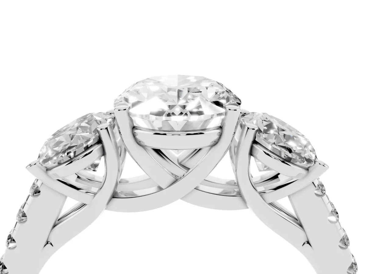 Three-Stone Oval Cut Diamond Ring with Round Pavé Band and Prong Setting Platinum