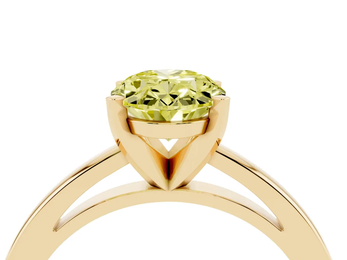 Fancy Yellow Oval Cut Solitaire Diamond Engagement Ring with Four-Prong Setting on a Classic Band Yellow gold