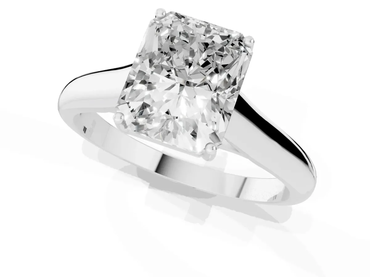 Radiant Cut Solitaire Engagement Ring with Tapered Band and Four-Prong Setting White gold