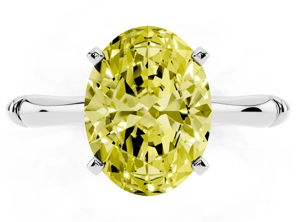 Fancy Yellow Oval Cut Solitaire Diamond Ring with Bamboo Band and Four-Prong Setting Silver