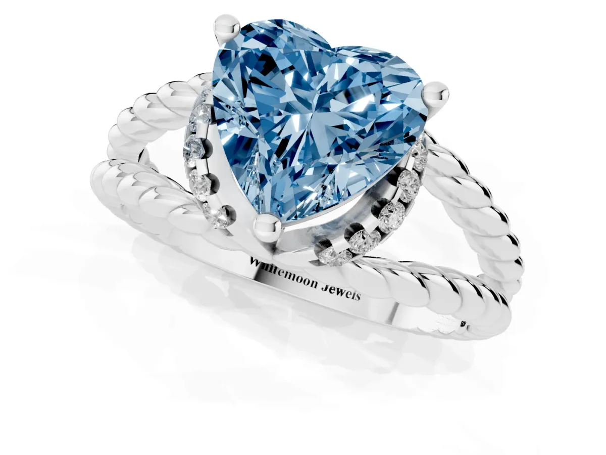 Fancy Blue Heart Cut Halo Twisted Band Four-Prong Ring Silver