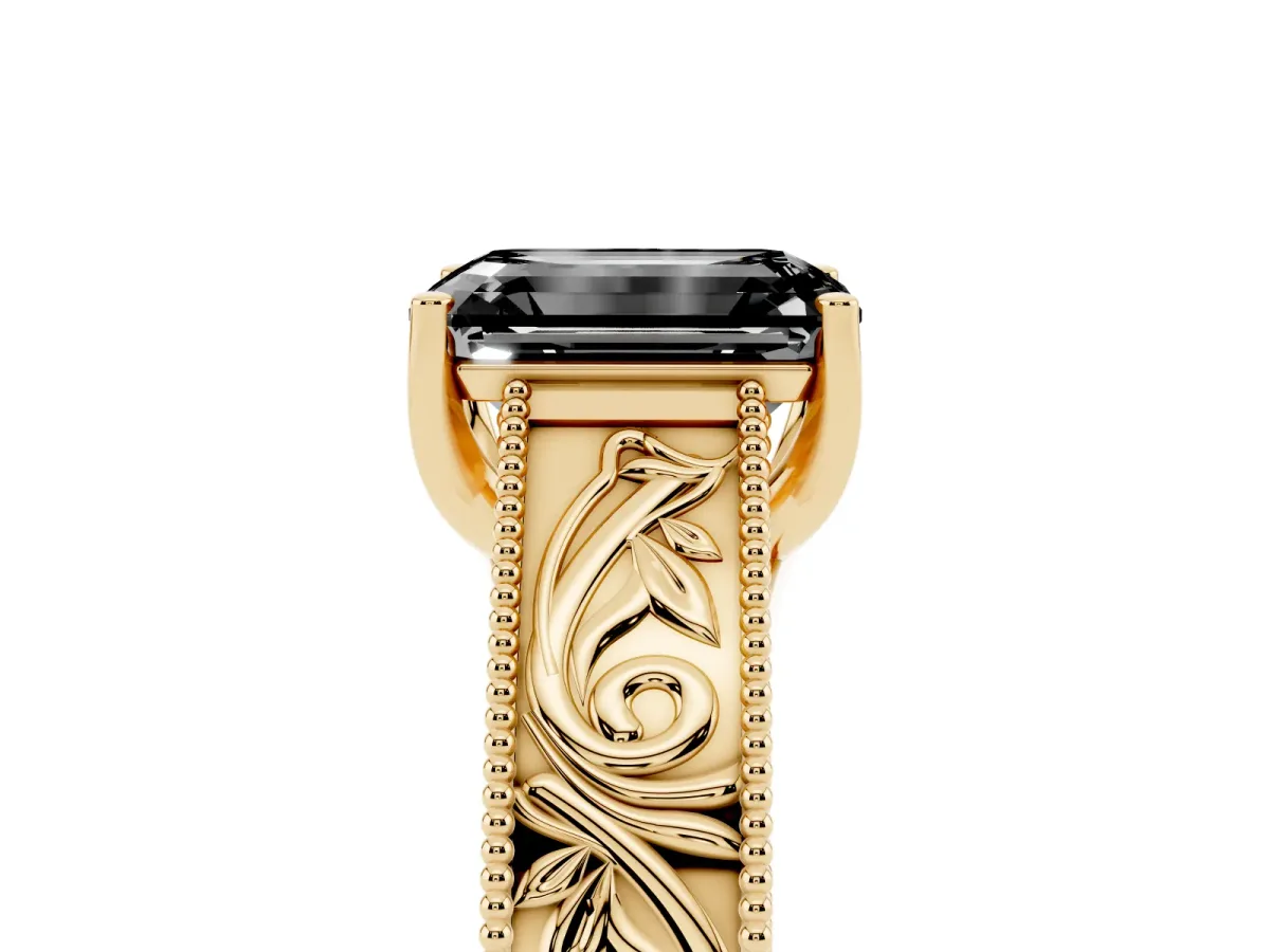 Fancy Black Emerald Cut Diamond Solitaire Ring with Engraved Band and Four-Prong Setting Yellow gold