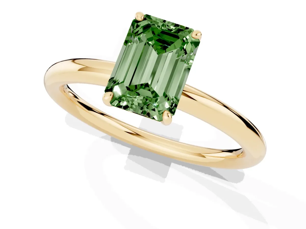 Fancy Green Emerald Cut Solitaire Diamond Ring with Four-Prong Setting on a Plain Band Yellow gold