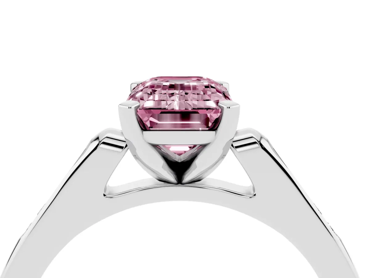 Fancy Pink Emerald Cut Diamond Solitaire Ring with Channel Set Round Band and Prong Setting White gold