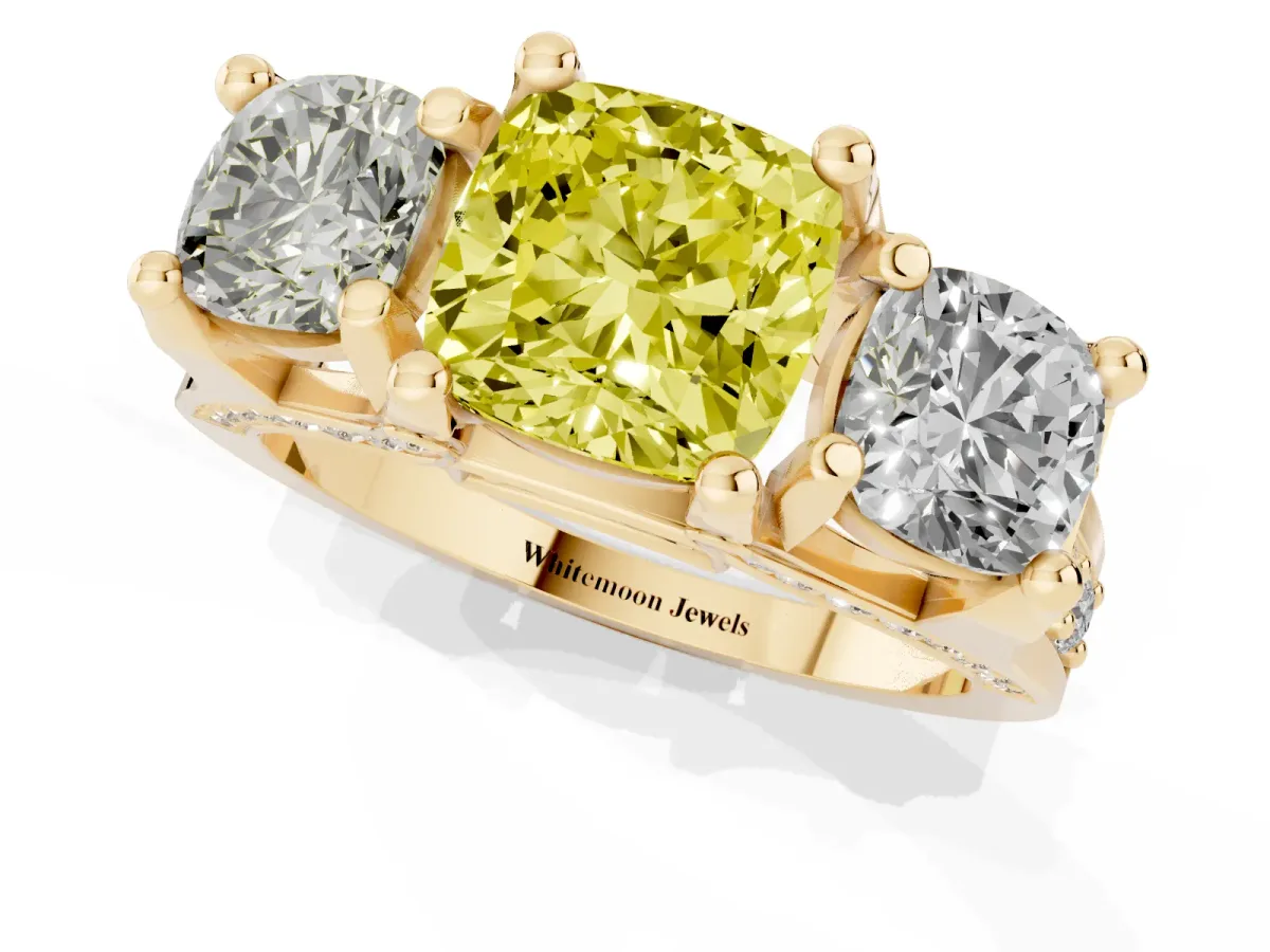 Fancy Yellow Cushion Cut Diamond Three-Stone Ring with Channel Set Band and Four-Prong Setting Yellow gold