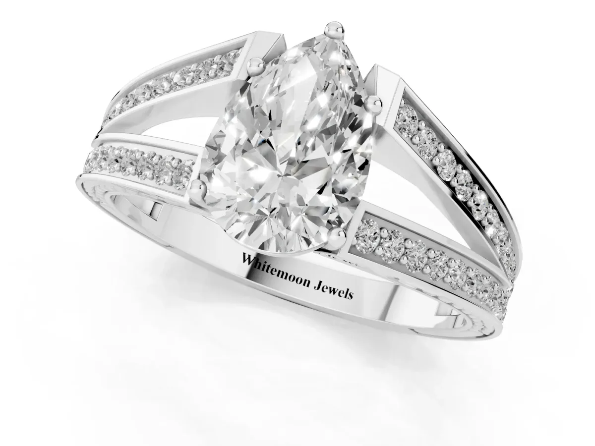 Pear Cut Diamond Split Shank Ring with Pavé Band and Four-Prong Setting White gold