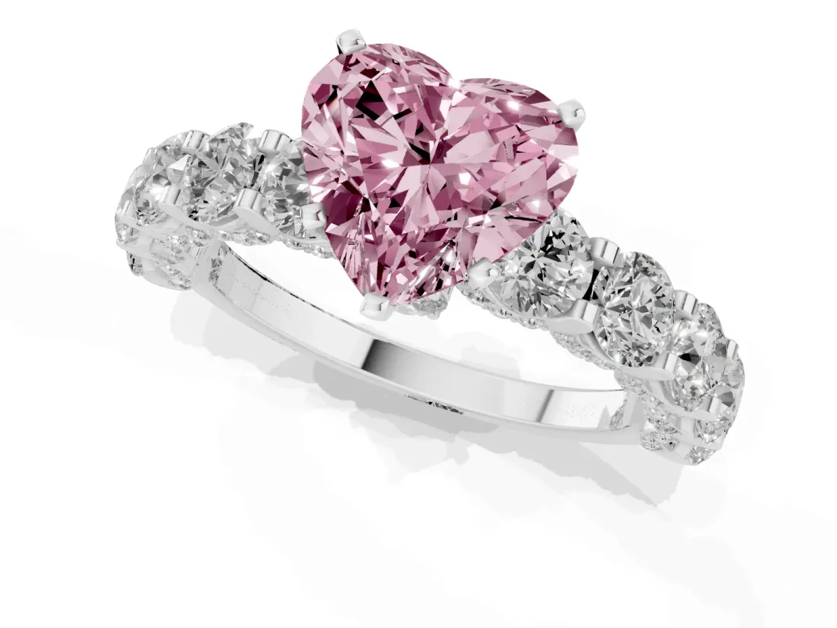 Fancy Pink Heart Cut Diamond Side Stone Engagement Ring with Four-Prong Setting Silver