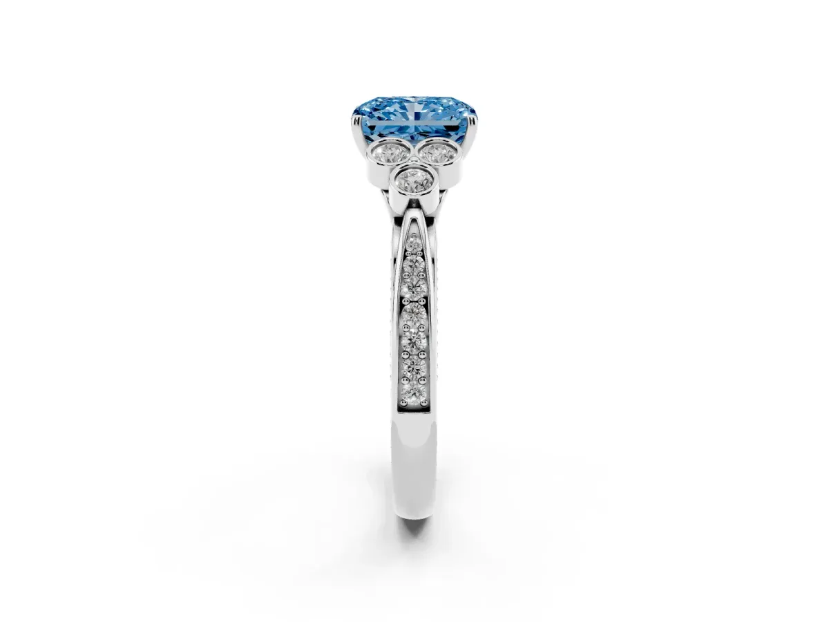 Fancy Blue Radiant Cut Cut Diamond Engagement Ring with Bezel Set Round Side Stones and Prong Setting Platinum
