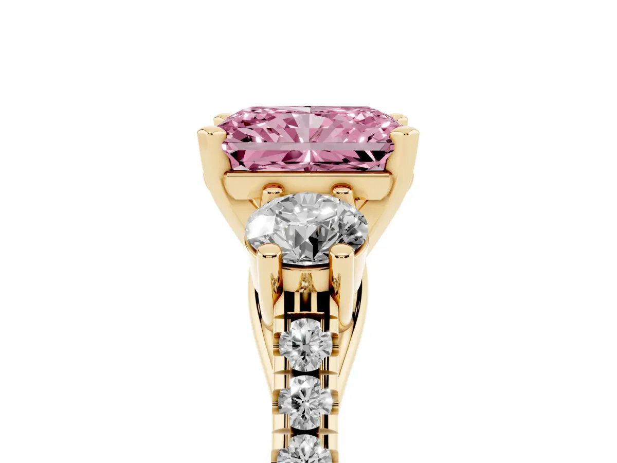 Fancy Pink Three-Stone Radiant Cut Diamond Pavé Band with Four-Prong Setting Yellow gold