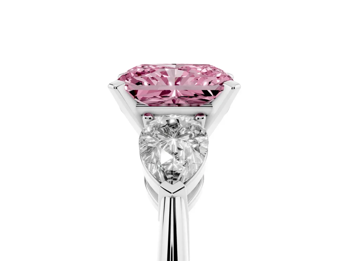Fancy Pink Three-Stone Radiant Cut Diamond Ring with Pear Side Stones and Four-Prong Setting Silver