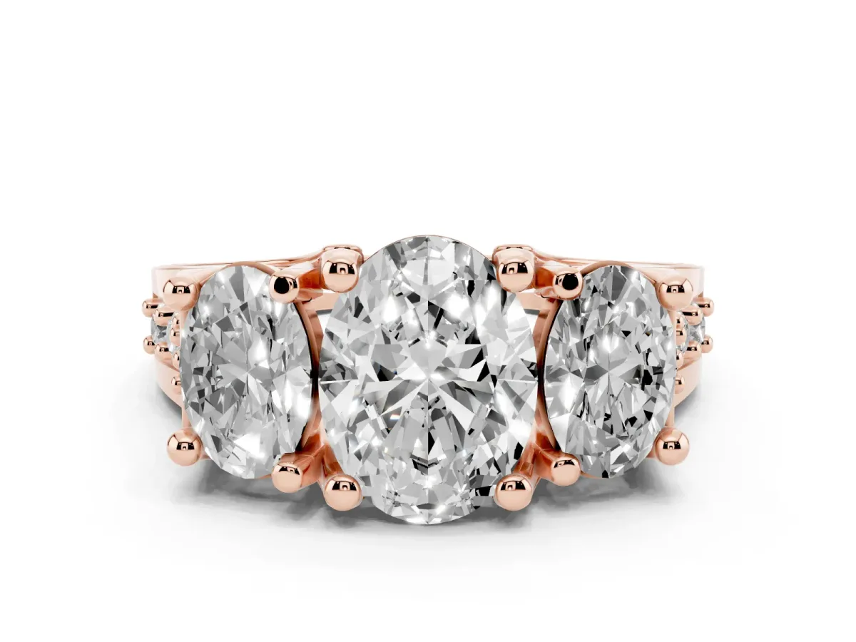 Oval Cut Diamond Three-Stone Ring with Channel Set Band and Four-Prong Setting Rose gold