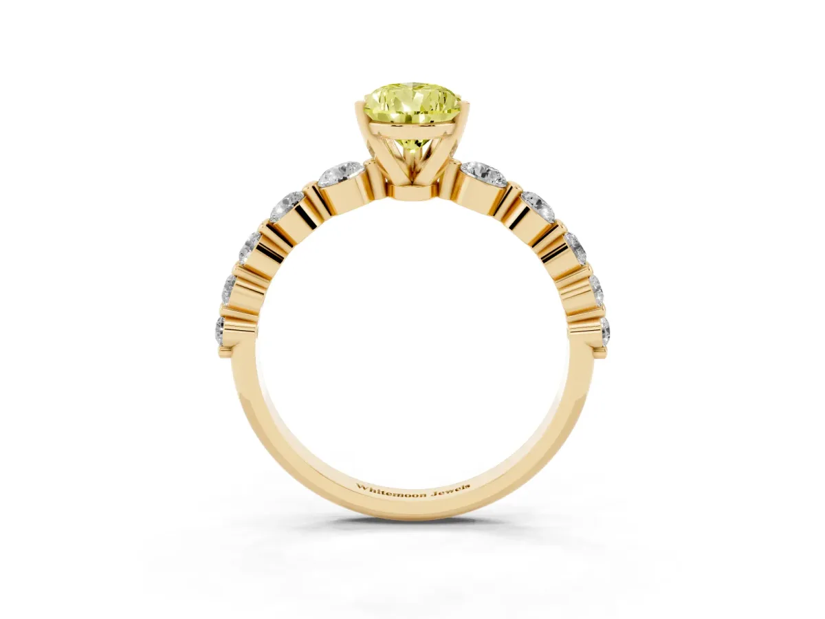 Fancy Yellow Pear Cut Solitaire Diamond Ring with Pave Band and Four-Prong Setting Yellow gold