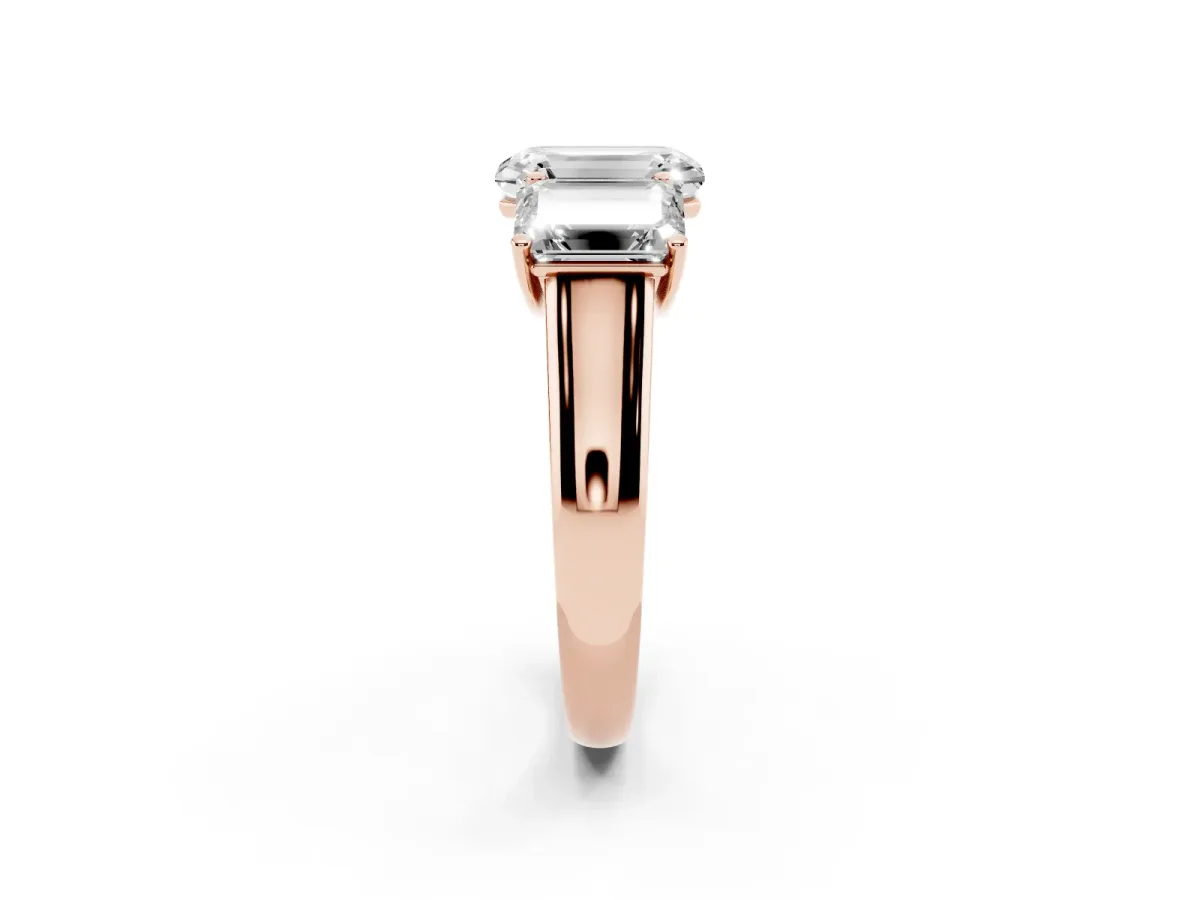 Emerald Cut Three-Stone Diamond Ring with Prong Setting on a Classic Band Rose gold