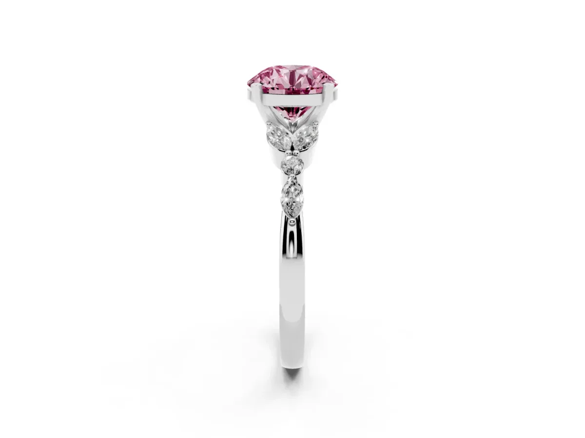 Fancy Pink Round Cut Diamond Solitaire Ring with Side Stones and Four-Prong Setting Platinum