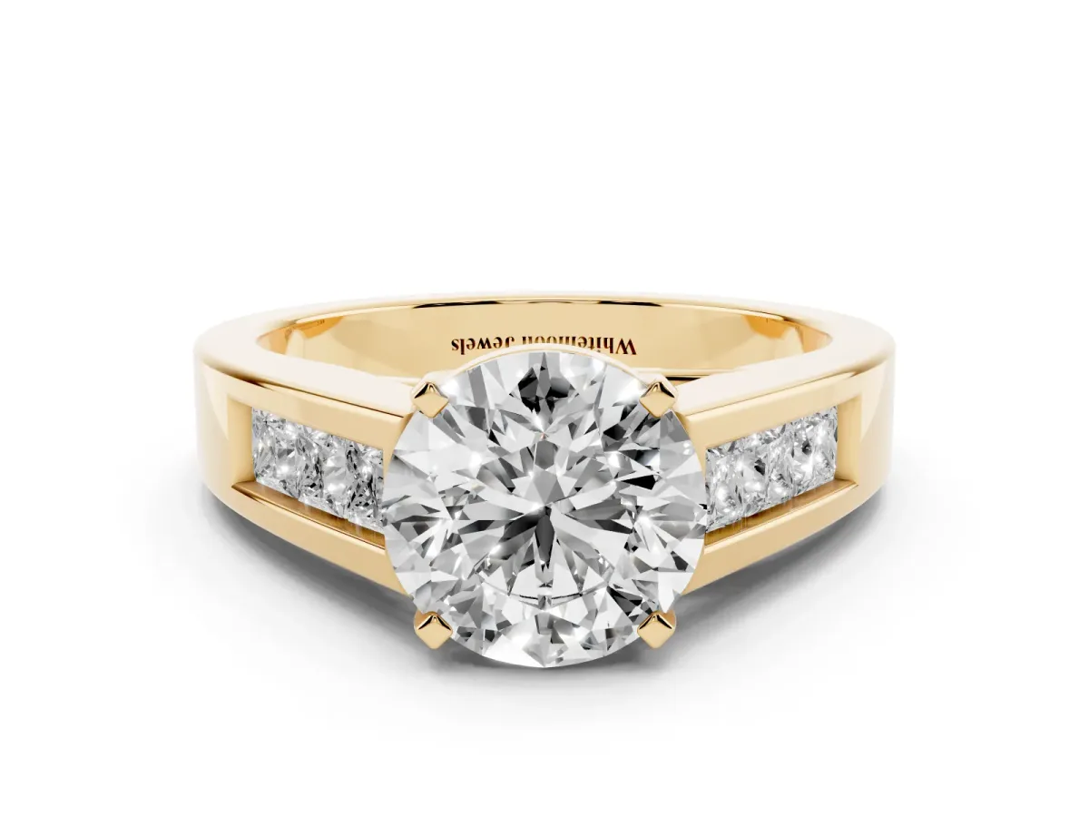Round Cut Cut Channel Set Solitaire Ring with Four-Prong Setting Yellow gold