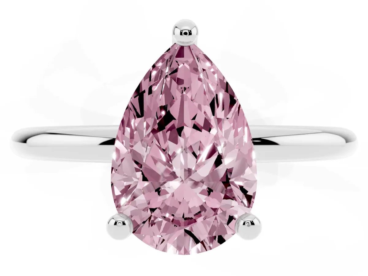 Fancy Pink Pear Cut Solitaire Diamond Ring with 4-Prong Setting on a Classic Band Silver