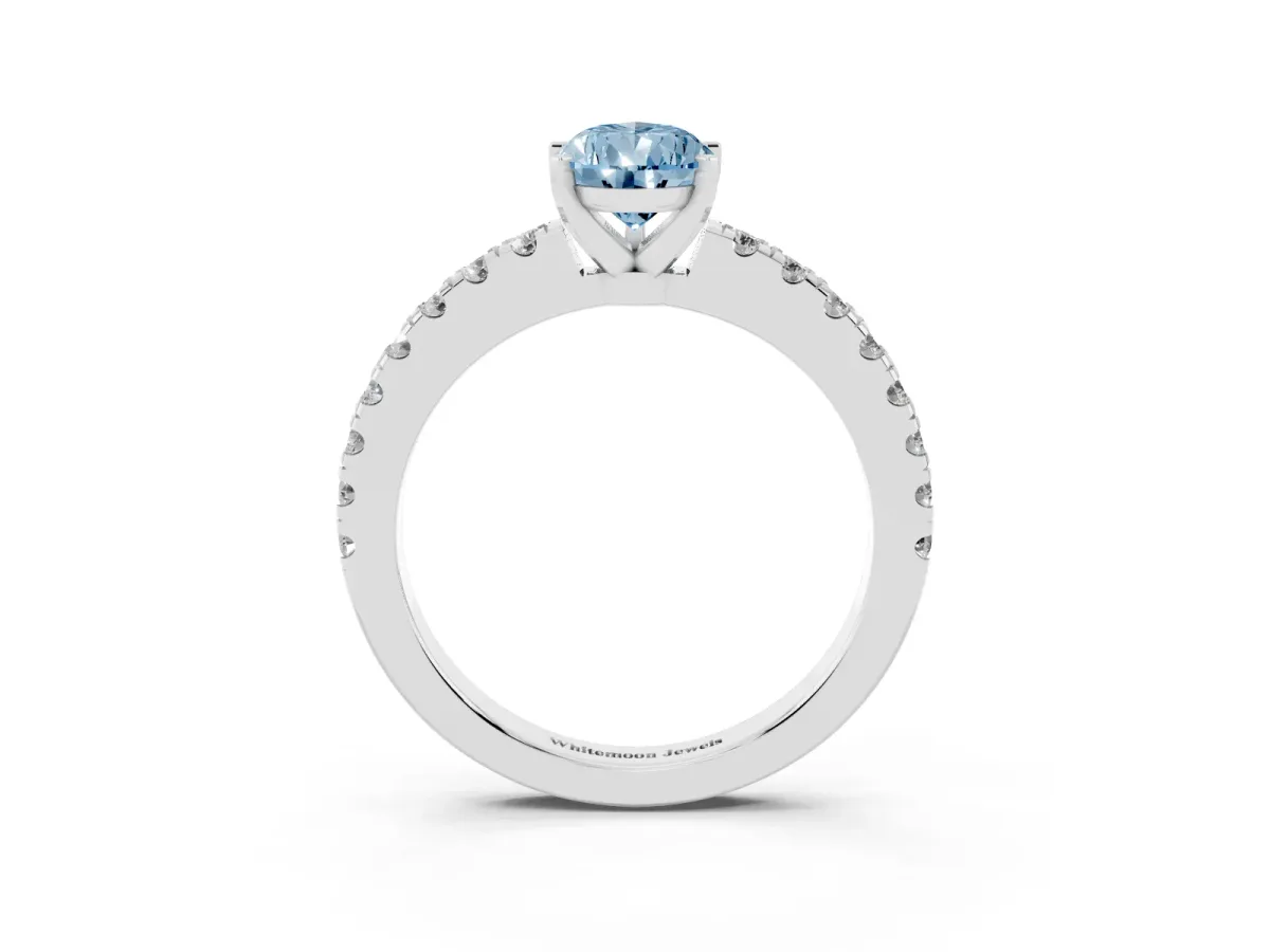 Fancy Blue Pear Cut Solitaire Diamond with Pavé Band and Four-Prong Setting Silver