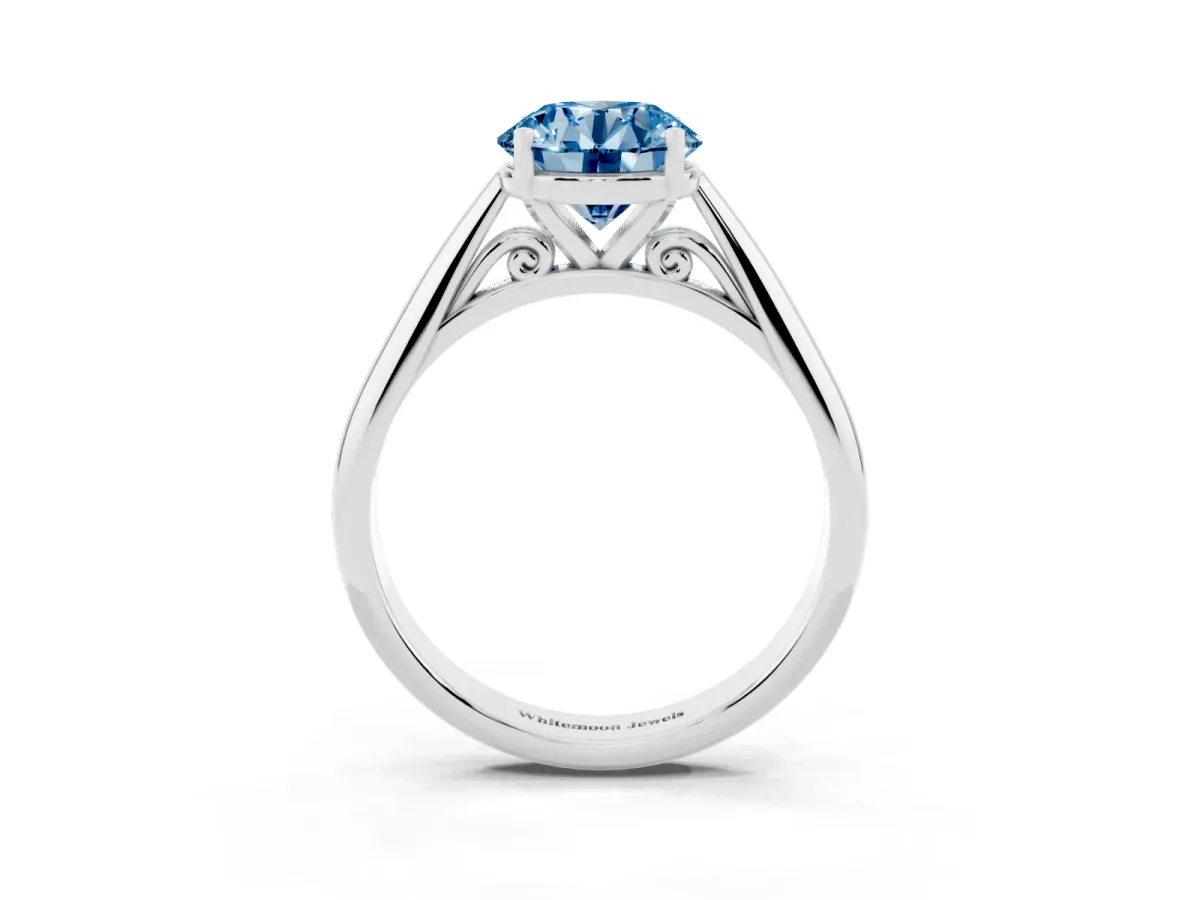 Fancy Blue Round Cut Diamond Solitaire Engagement Ring with Cathedral Setting and Four-Prong Mount Silver