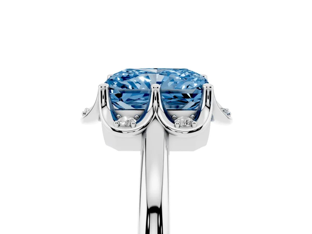 Fancy Blue Radiant Cut Halo Diamond Ring with Round Cluster Setting, Solitaire Band, and Four-Prong Setting Platinum