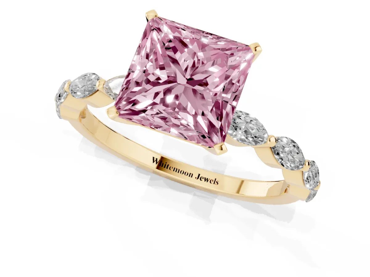 Fancy Pink Princess Cut Diamond Ring with Marquise Side Stones and Prong Setting Yellow gold