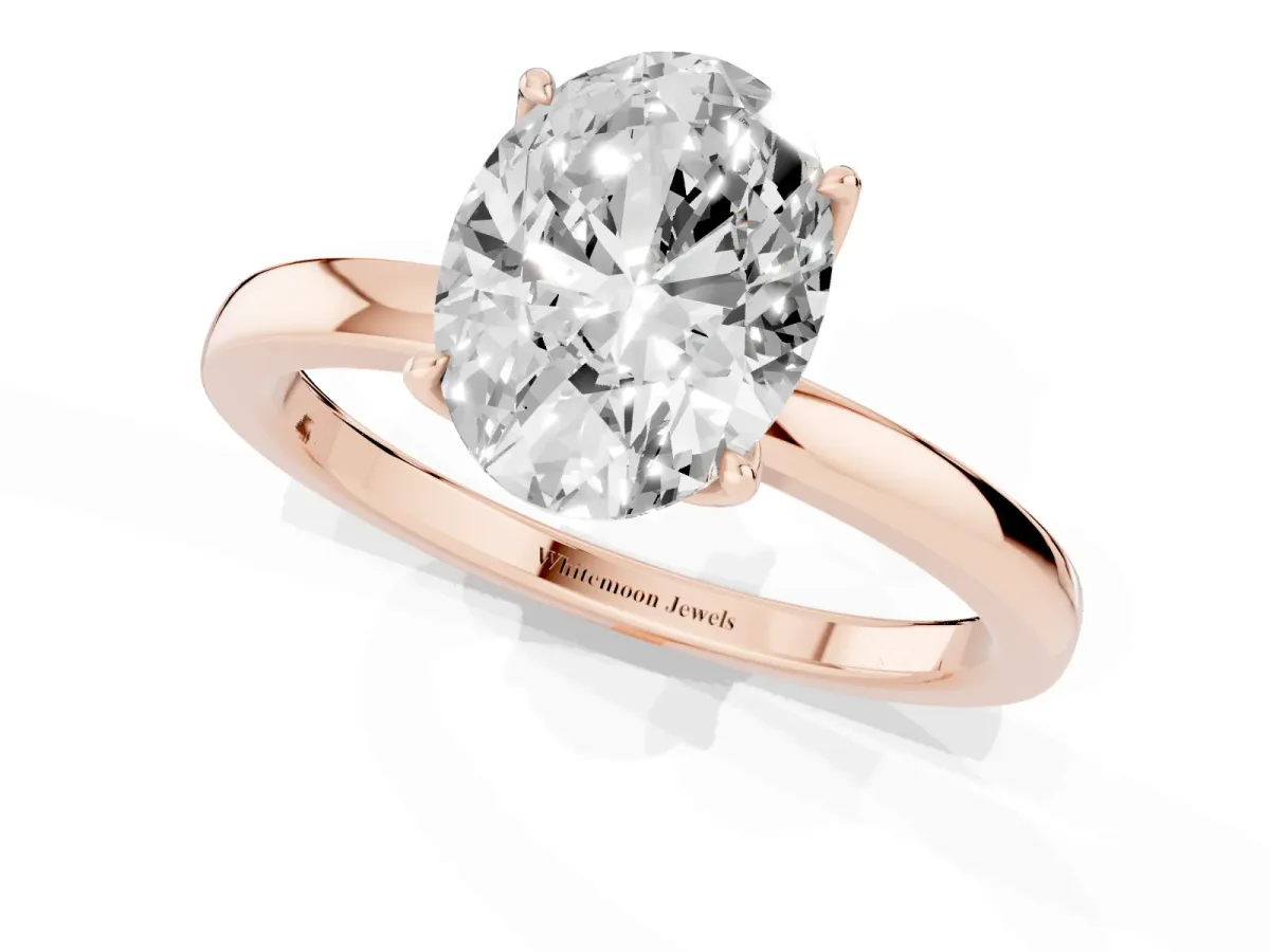 Oval Cut Diamond Solitaire Ring with Thin Band and Prong Setting Rose gold