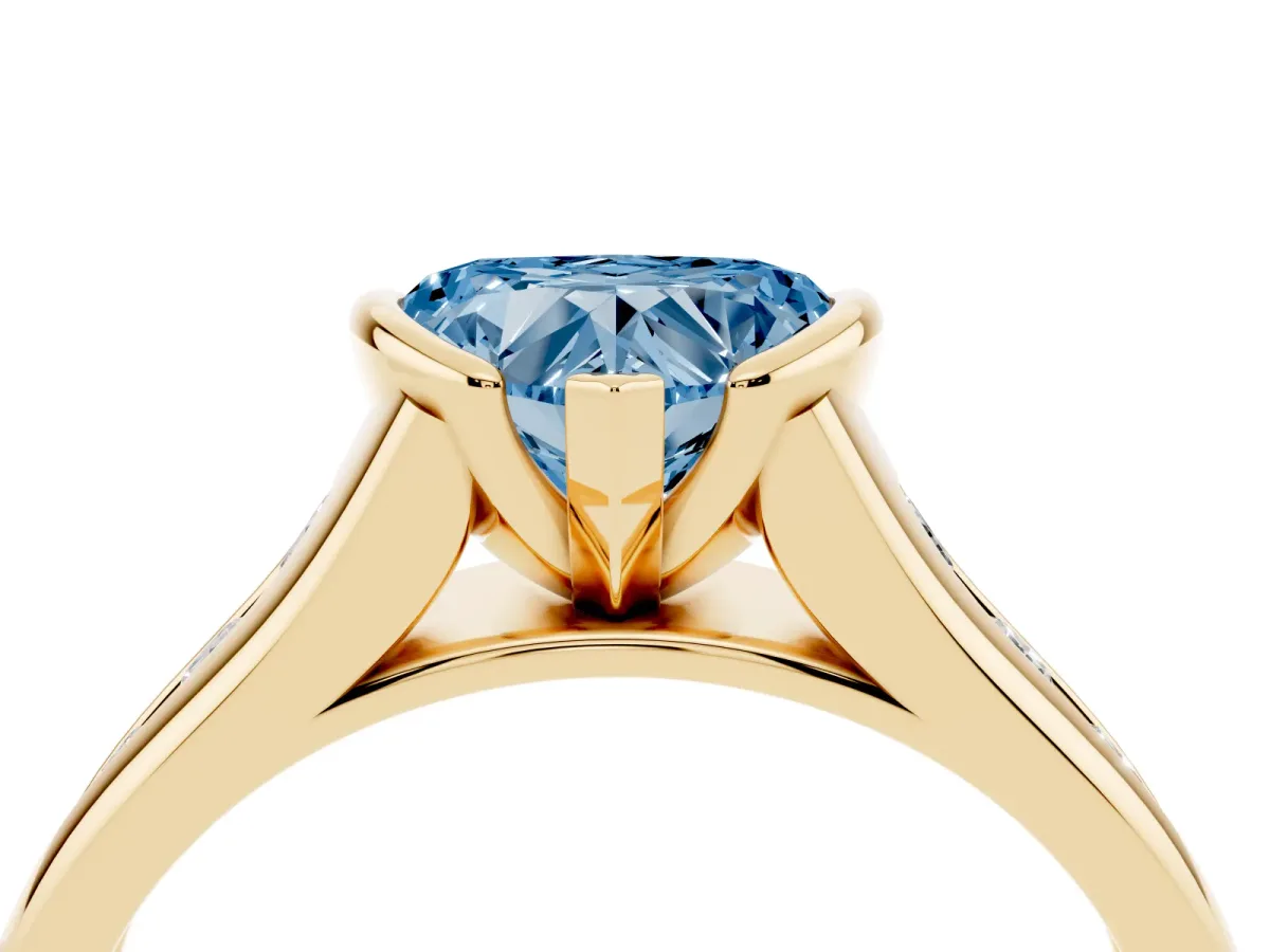 Fancy Blue Heart Cut Solitaire Bezel-Set Diamond Ring with Channel-Set Band Yellow gold