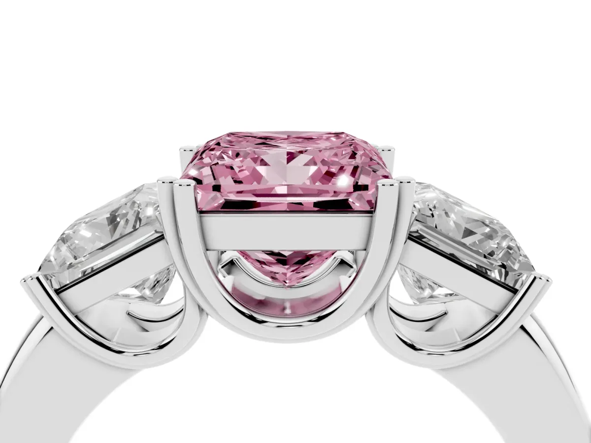 Fancy Pink Three-Stone Princess Cut Cut Diamond Ring with Channel Set Band and Four-Prong Setting Silver