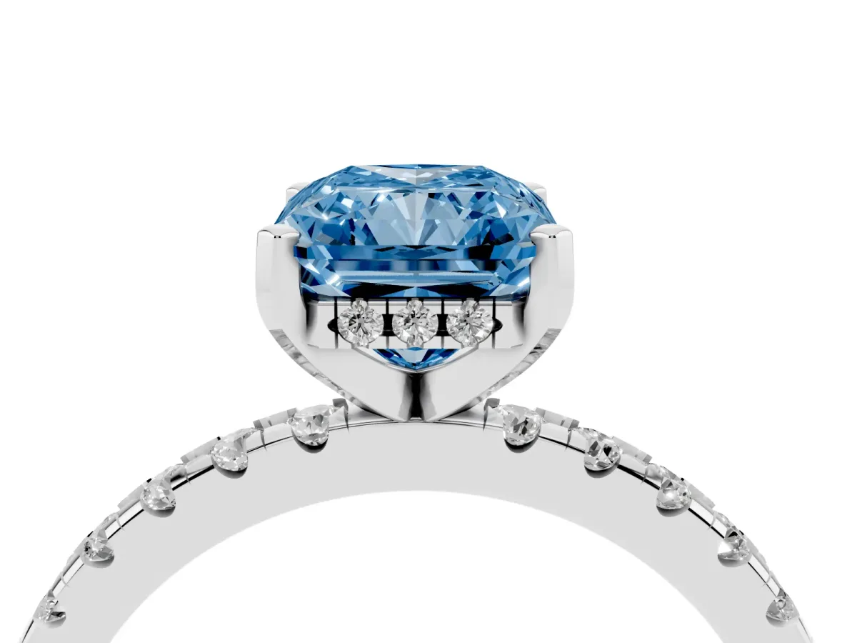 Fancy Blue Radiant Cut Diamond Solitaire Ring with Round Pavé Band and Four-Prong Setting Silver